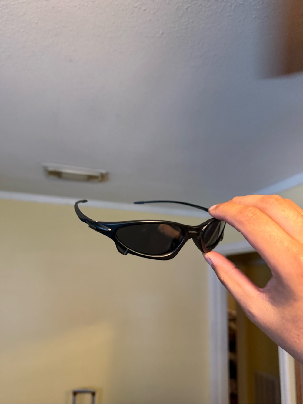 Sleek Black Sport Sunglasses Oakley Oakleys